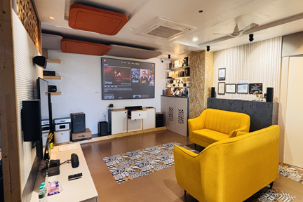 Modern home theater setup with premium seating and projection system